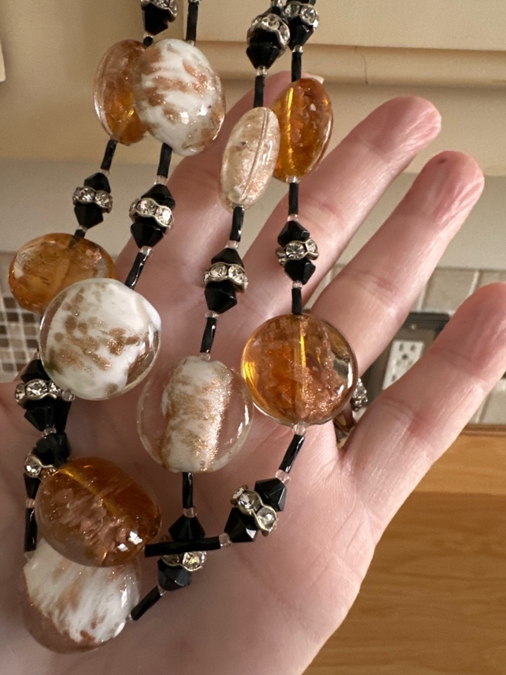 Amber and white Swirl Glass Bead Necklace with Black beads and crystal accents